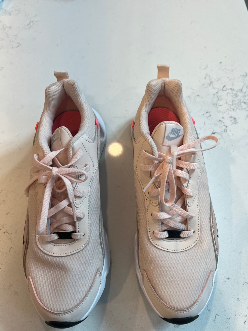 Nike Women’s Light Pink Lace-Up Sneakers with Coral Accents